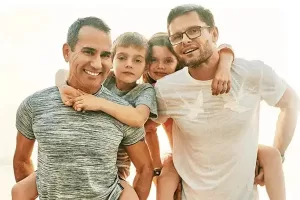 LGBTQ gay couple with kids and families benefit from the best financial planner